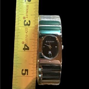 Gloria Vanderbilt Vintage Silver Tone Cuff Watch @7” around (needs battery)